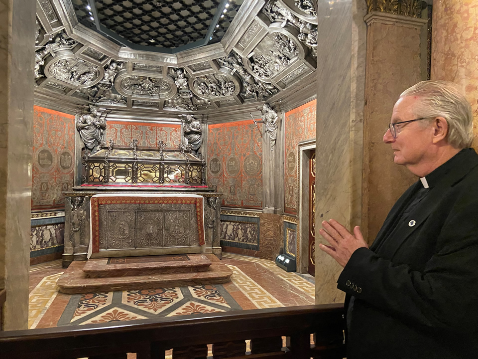Fr. Brown prays at the tomb of St. Charles Borromeo, patron saint of seminarians, during his visit to the Duomo (Cathedral) of Milan.
